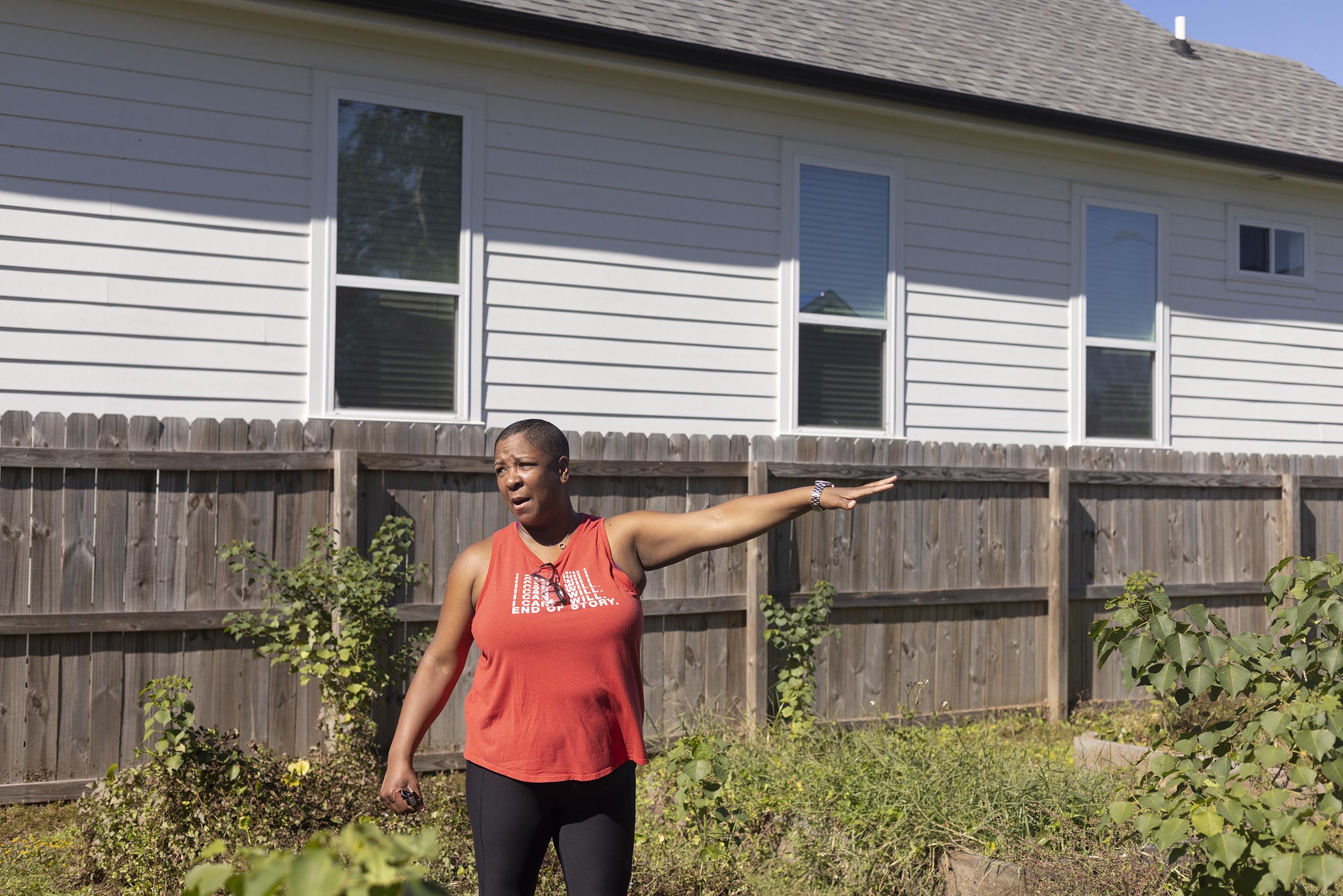 Dee Dee shows off Hollygrove Community Garden.