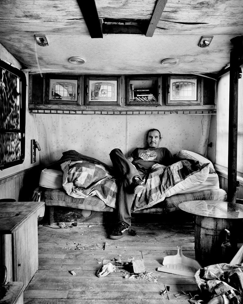 Billy Forbis, 55, grew up in the town of Picher, Oklahoma, a lead and zinc mining center that was evacuated due to unsafe conditions and contamination in 2009. He is photographed in the trailer where he lived while battling methamphetamine addiction. Now clean, he helps other recovering addicts in his town.