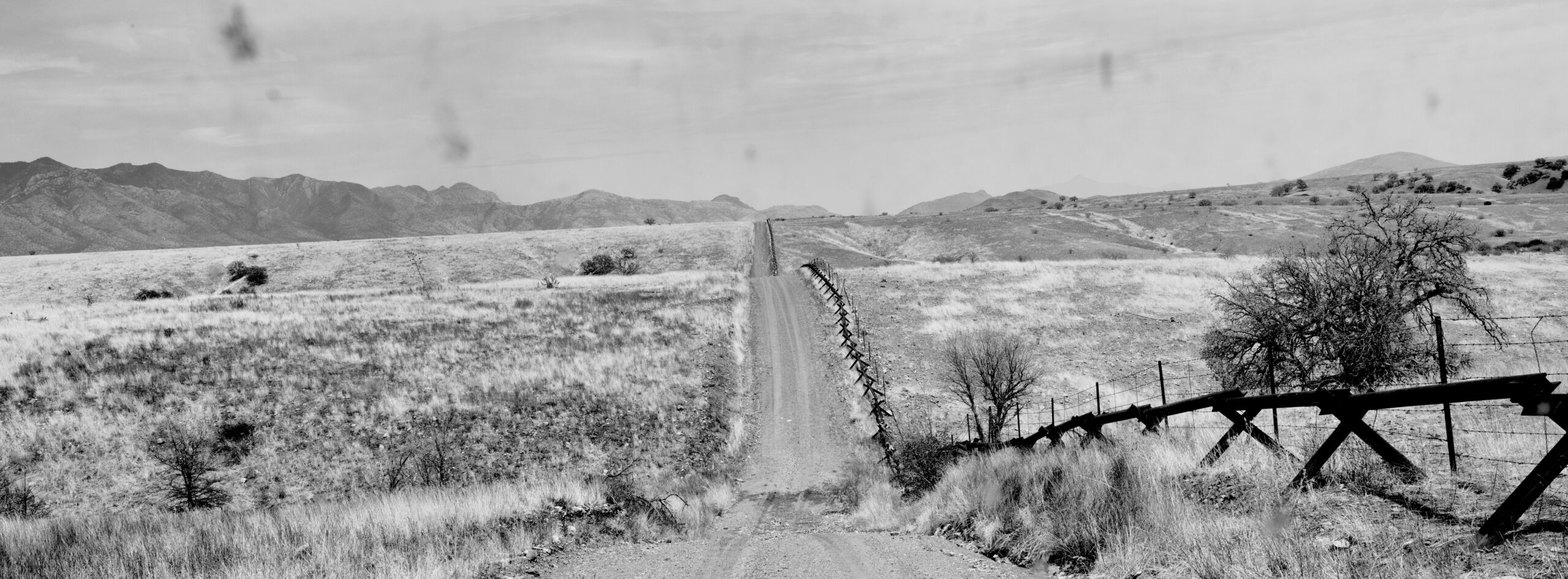 The US / Mexico border bisects the San Rafael Valley in southern Arizona.