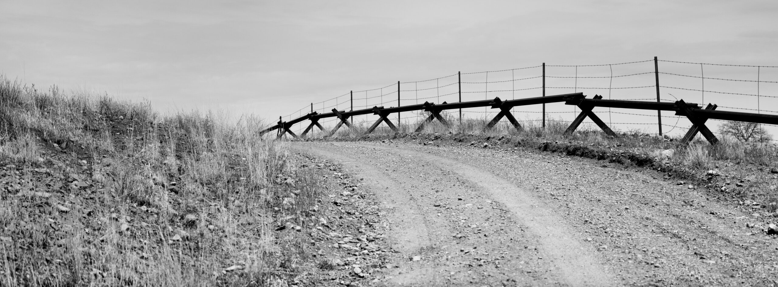 The US / Mexico border bisects the San Rafael Valley in southern Arizona.