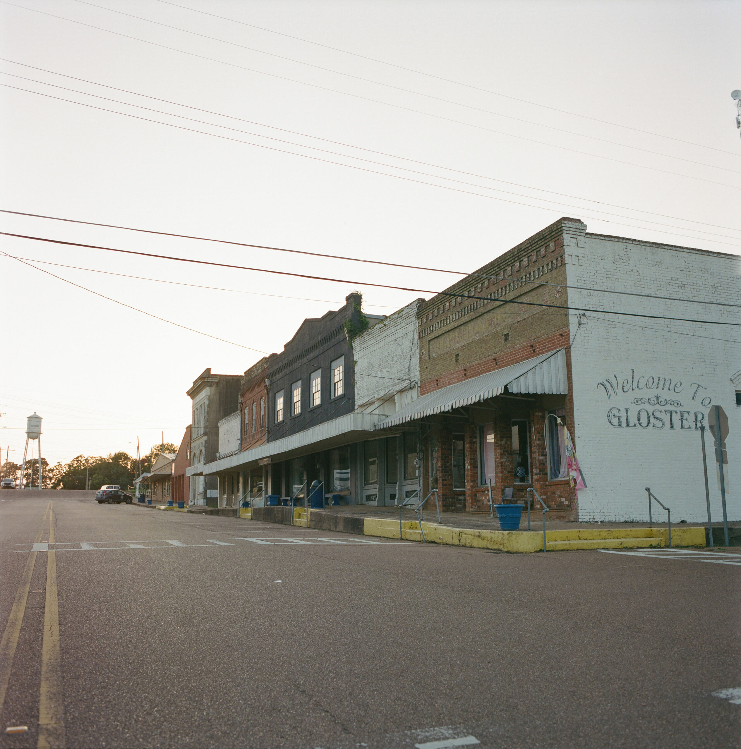 Gloster, Mississippi, a small rural town near the Louisiana border, struggles with environmental and health challenges. The nearby Drax Amite BioEnergy Plant emits particulate matter and pollutants linked to rising rates of asthma, respiratory illness, and cancer, particularly among children and the elderly, while heavy truck traffic and noise further burden the community.