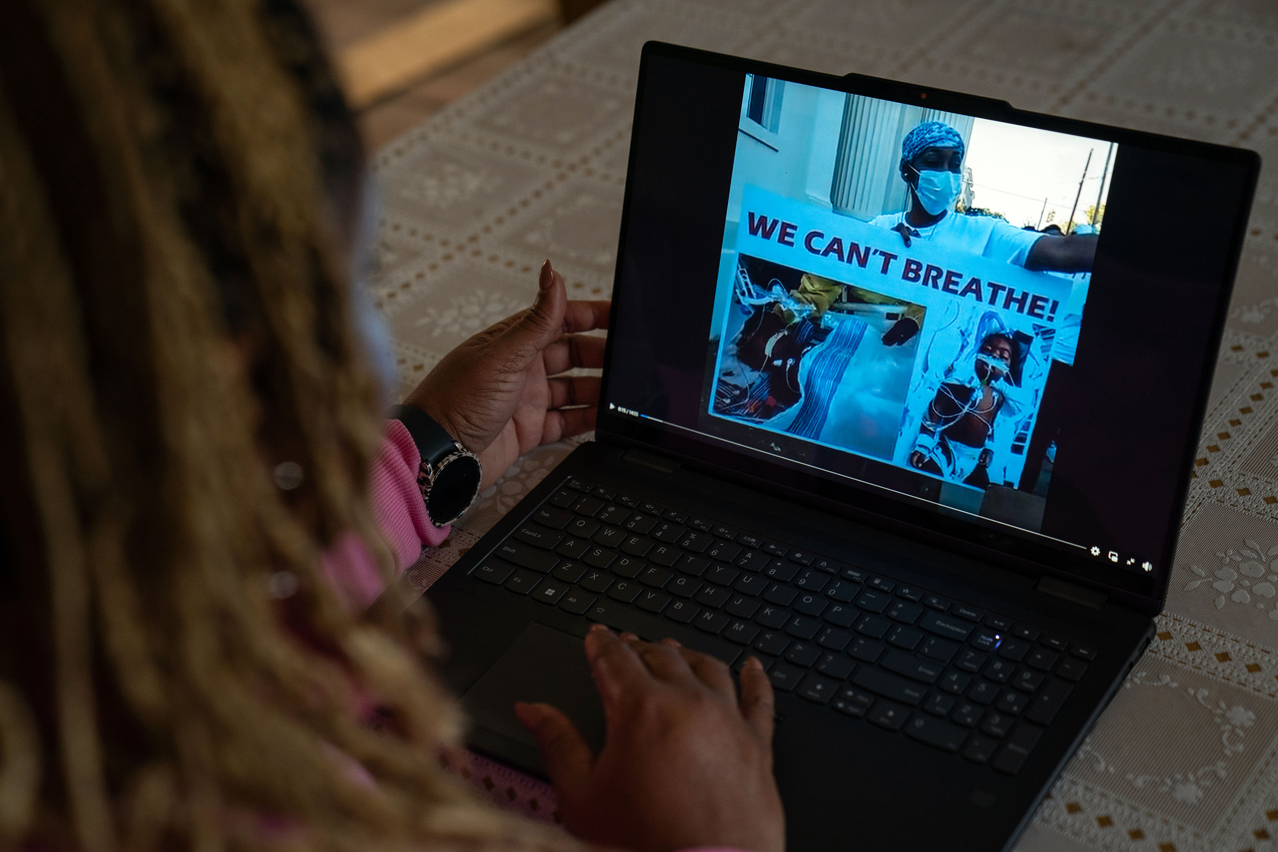 Carletta browses her organization’s website.