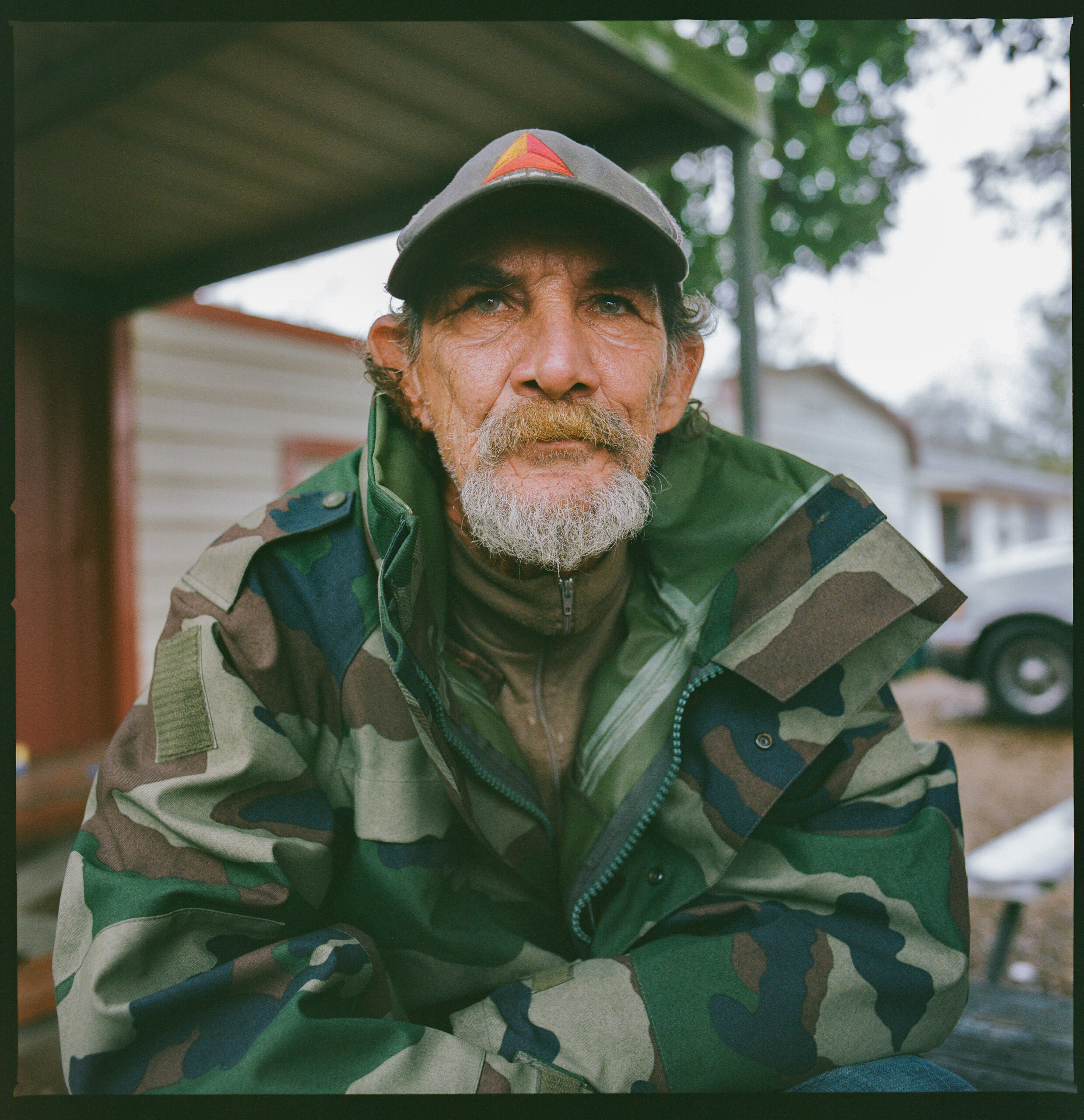 Jerry De Witt—currently unhoused and living in his minivan—receives free food at Open Door Biker Church, delivered by Lyke.