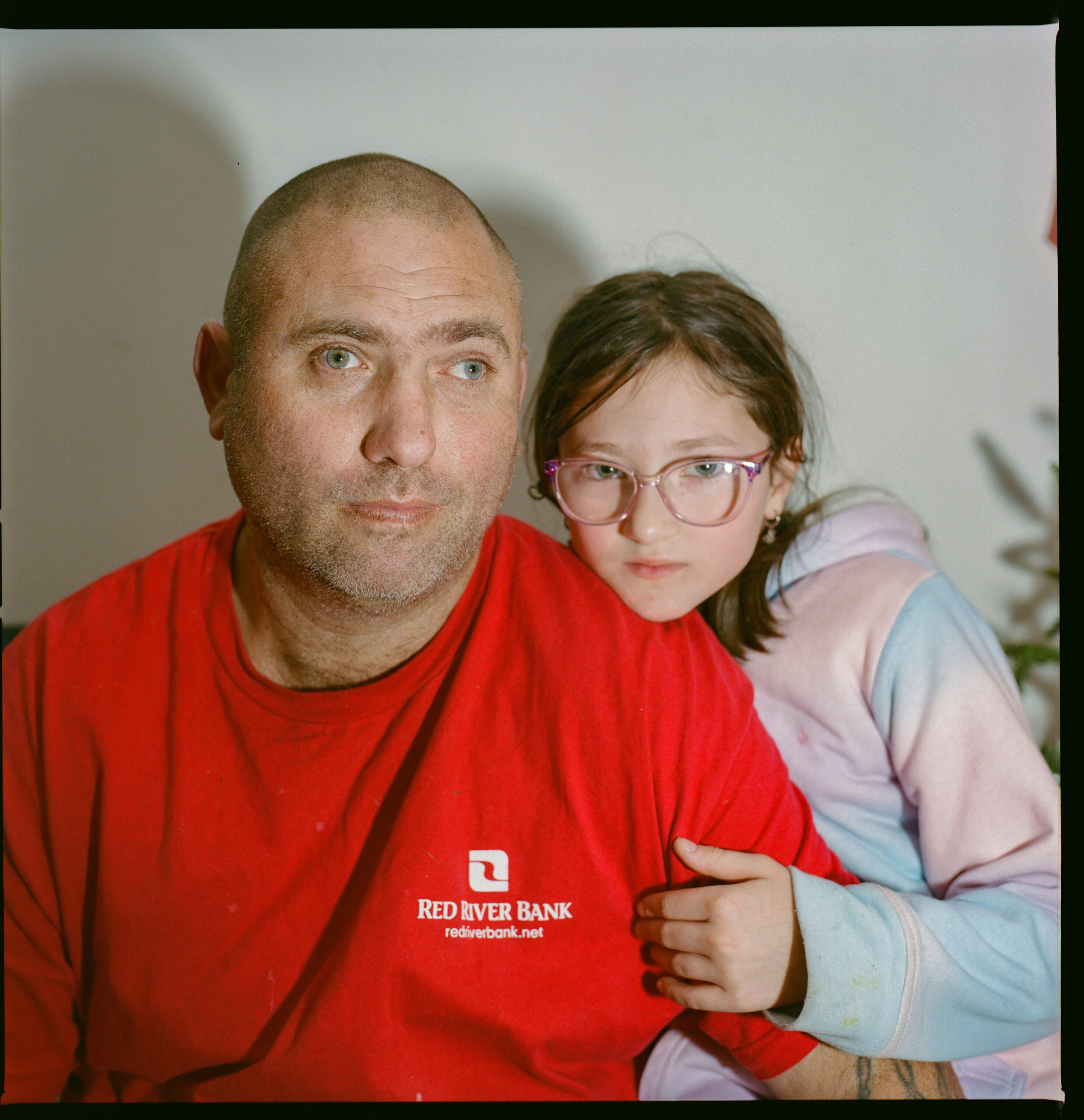 Brett Romero (47) and his daughter Nashota Willis (8) attend the Village Coffee House monthly party. Cindy led an educational talk on environmental awareness and healing for unhoused community members and those struggling with addiction in the Sulphur area. Attendees enjoyed free snacks and drinks throughout the event.