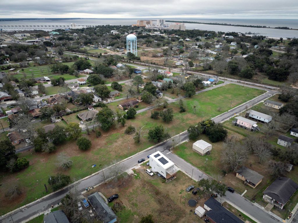 A Steps Coalition housing development site (green space) remains in Biloxi.