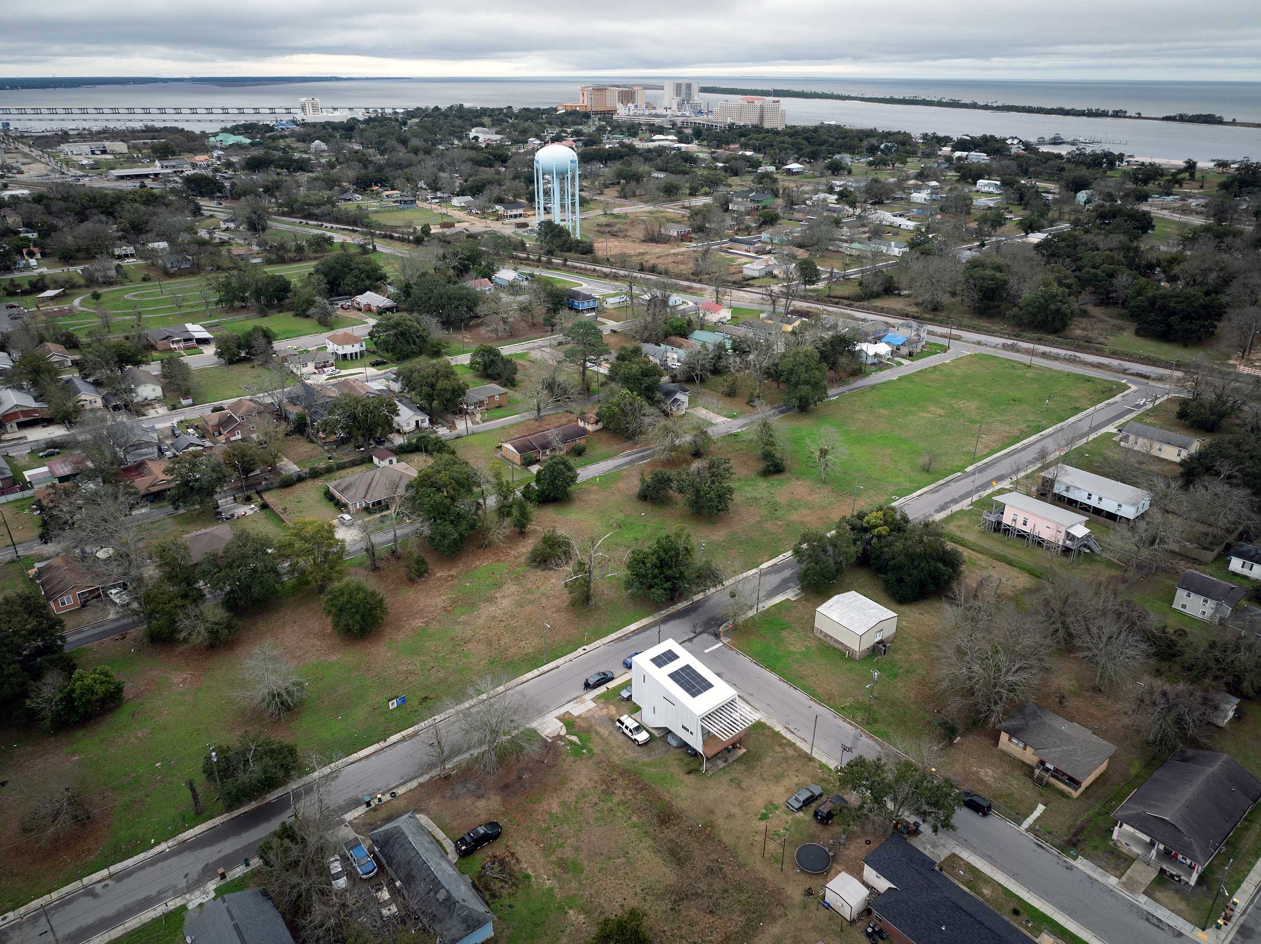 A Steps Coalition housing development site (green space) remains in Biloxi.